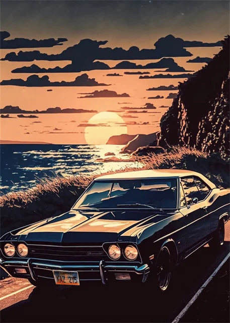 Vintage car on a coastal road with a sunset in the background